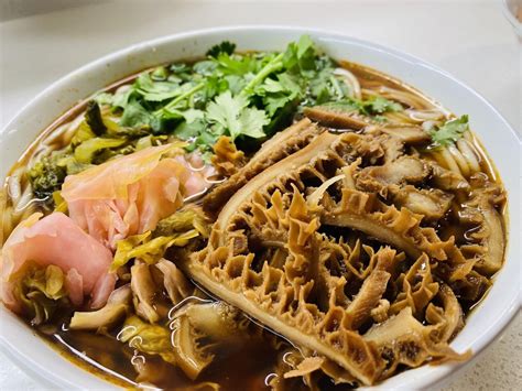  ライビン米粉：スパイシーな旨味と爽やかな酸味が織りなす、忘れられない一品！